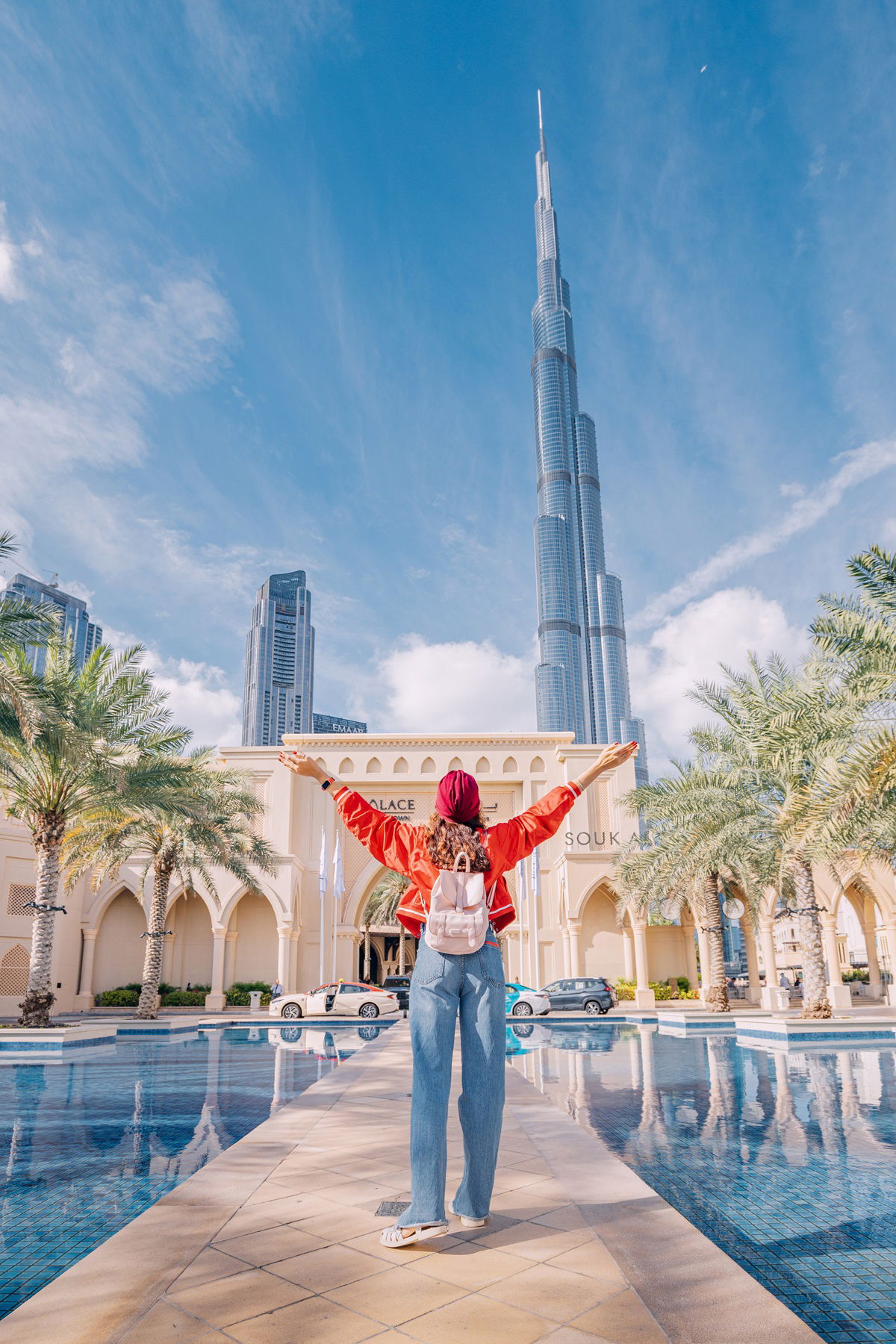 Woman in the streets of Dubai in front of Burj Khalifa
