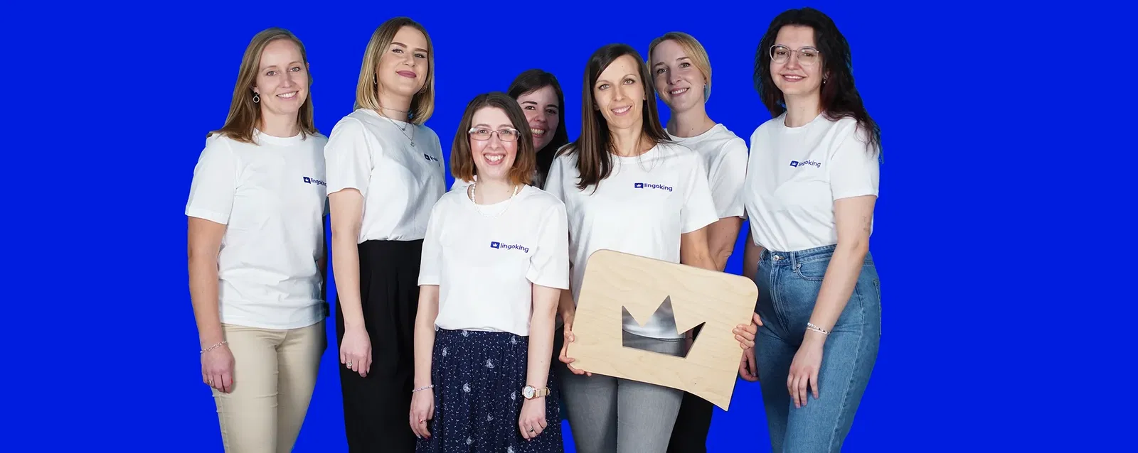 lingoking project management team holding the lingoking logo