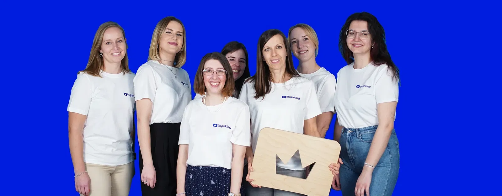 lingoking project management team holding the lingoking logo