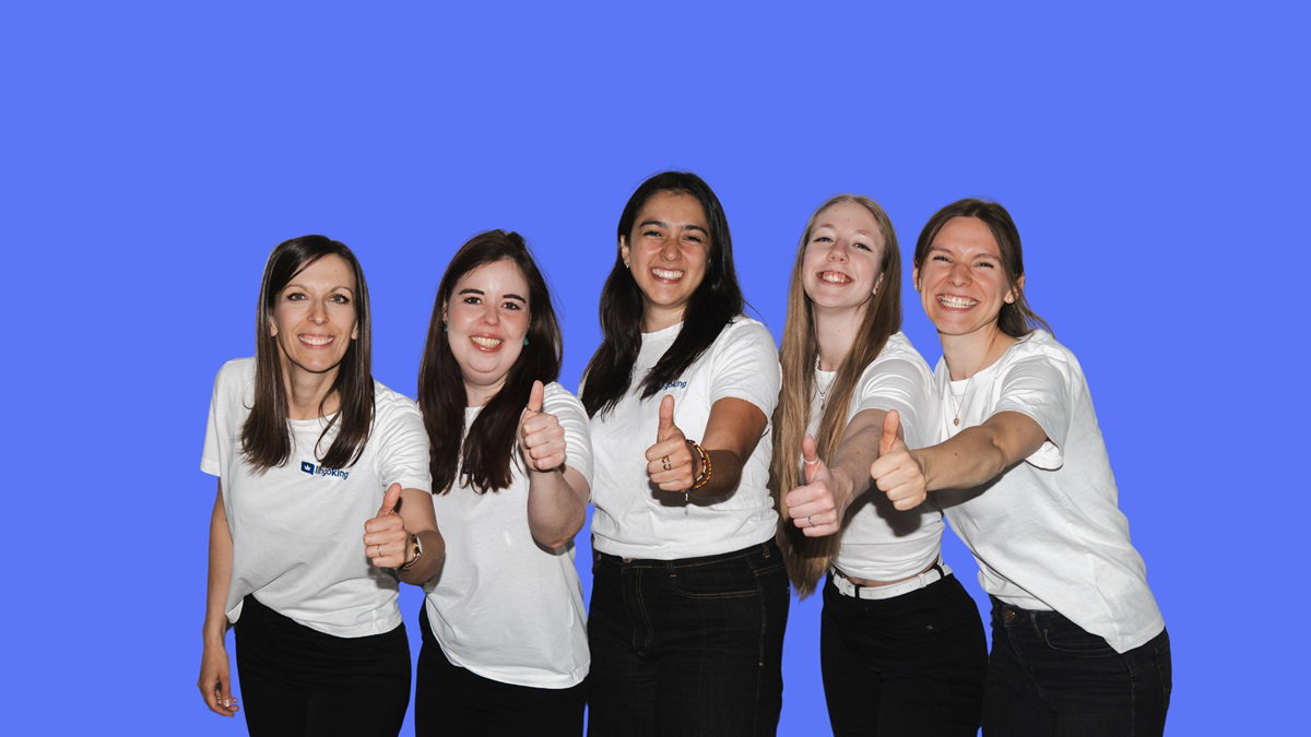 lingoking customer support team holding up one of the team members