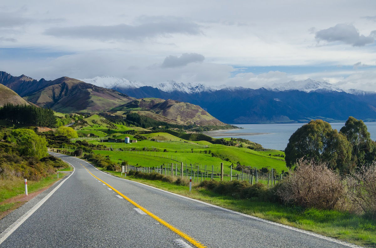Mountaints, lake and road in New Zealand