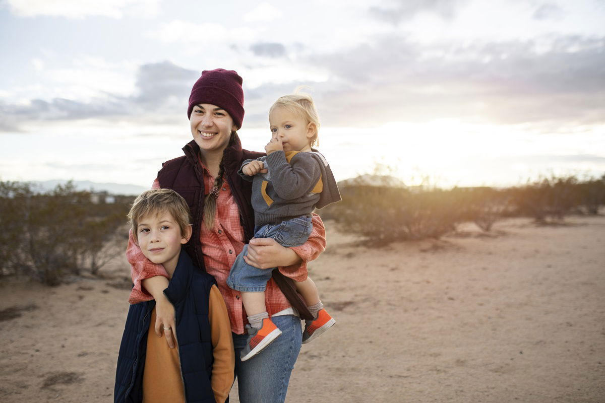 Woman with children in the desert