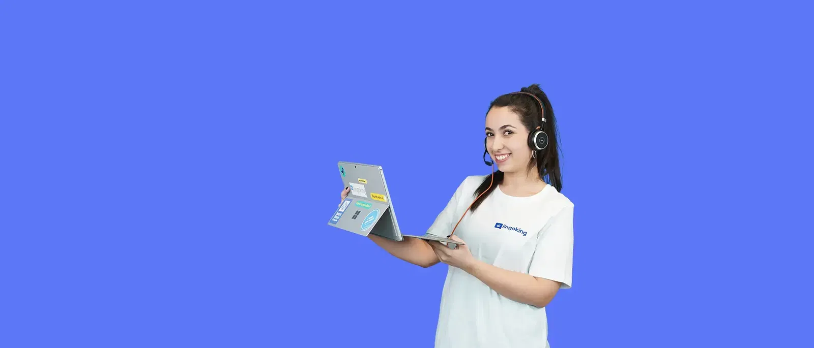 Employee of lingoking with tablet and headset