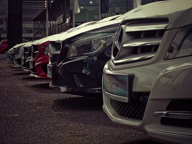 Mercedes cars standing in a row