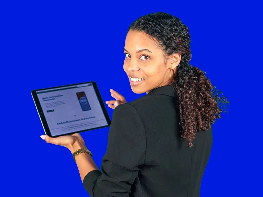 lingoking employee showing the lingoking website on a tablet