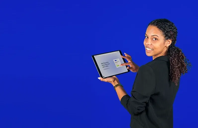 lingoking employee showing the webiste on a tablet