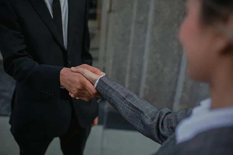 Two people shaking hands