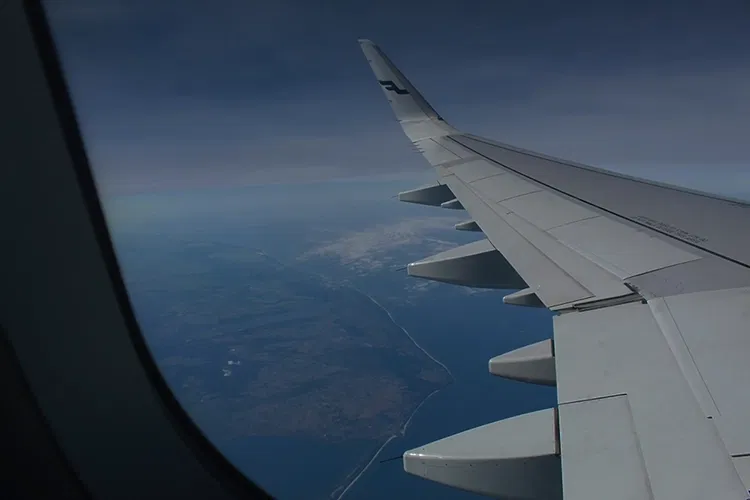 Wing of an airplane in the air
