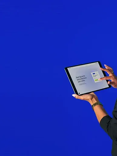 lingoking employee showing lingoking website and smiling