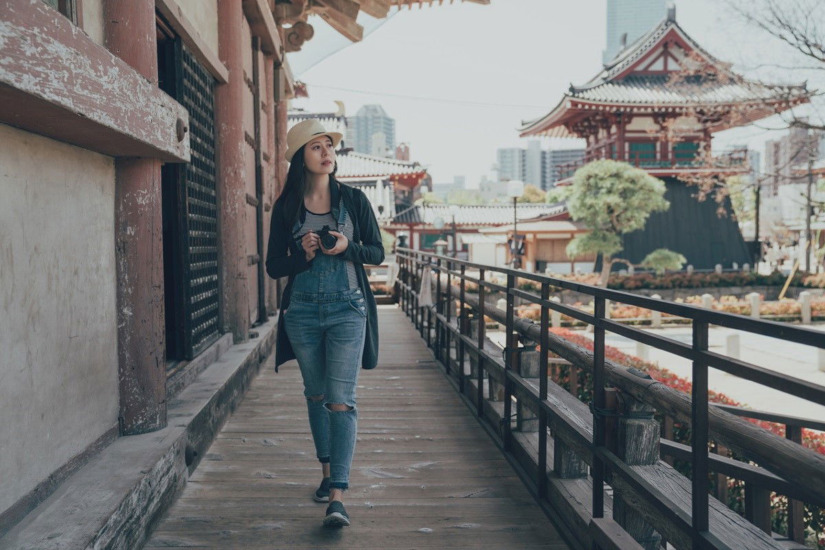 Woman at Shitennoji Temple in Osaka, Japan